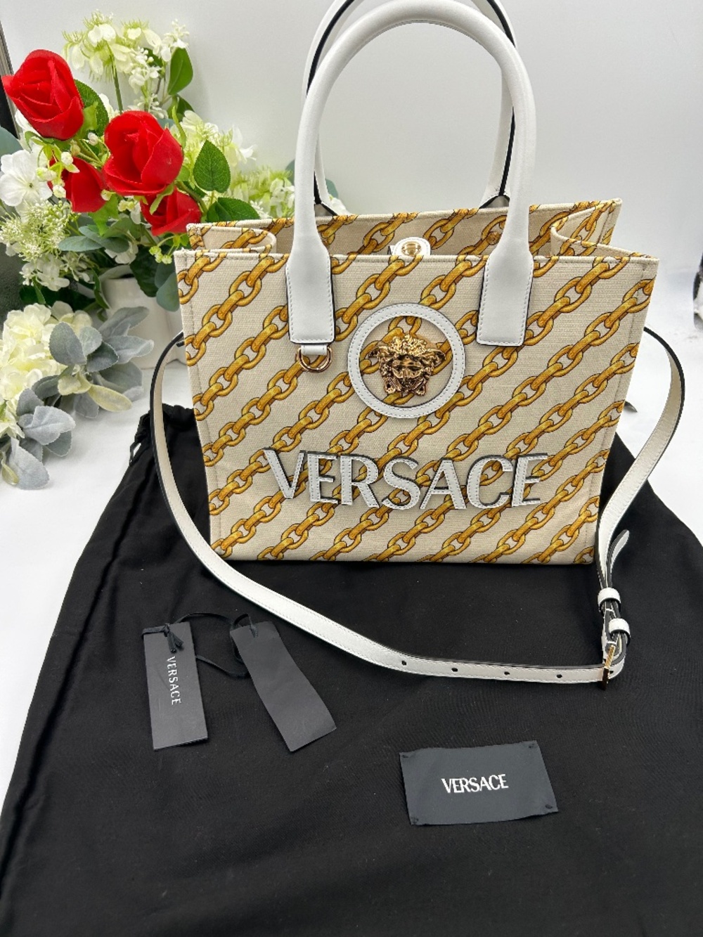 Women’s Versace chain stripe Medusa tote bag w/shoulder strap. Made in Italy.